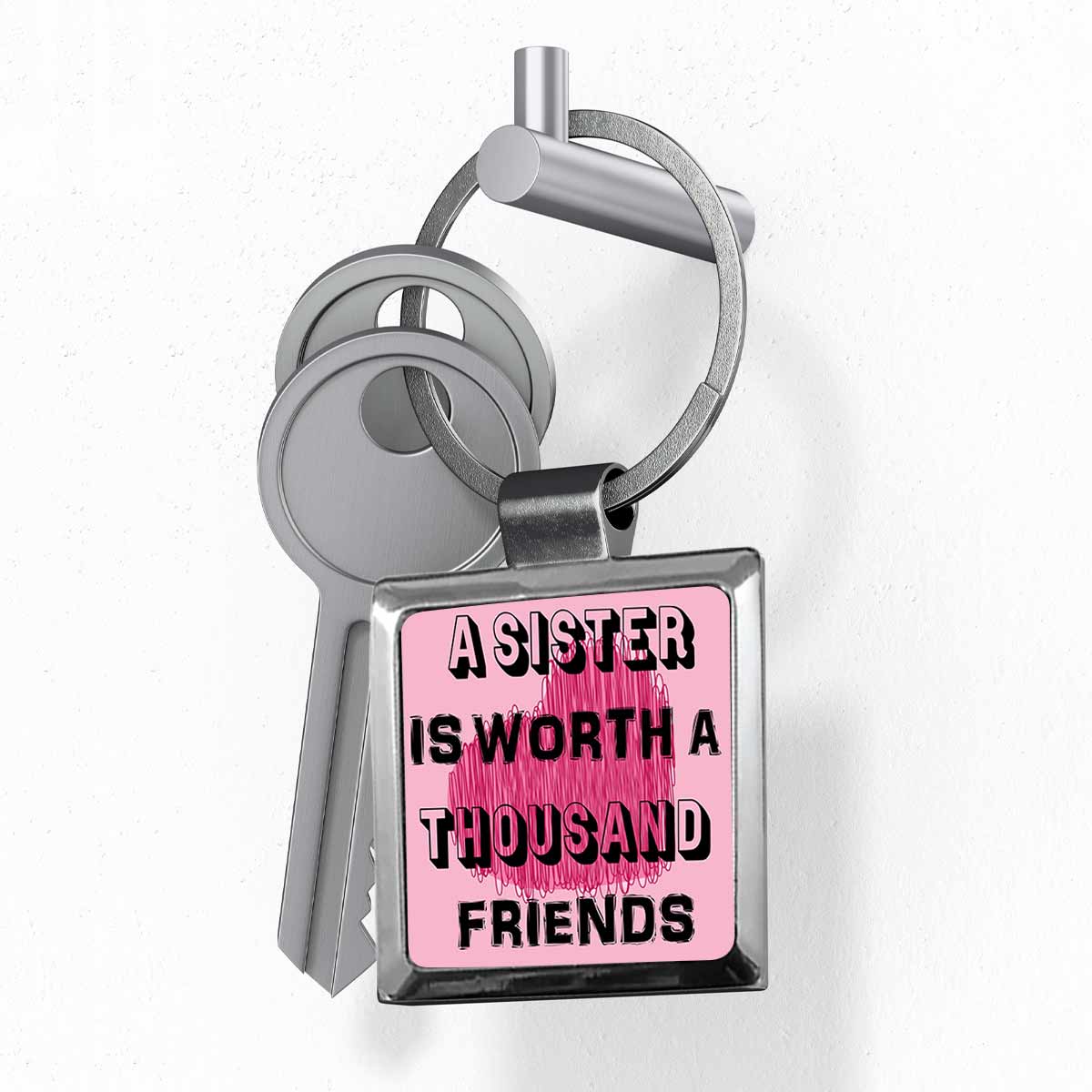 A Sister is worth Thousand Friends Metal Keychain