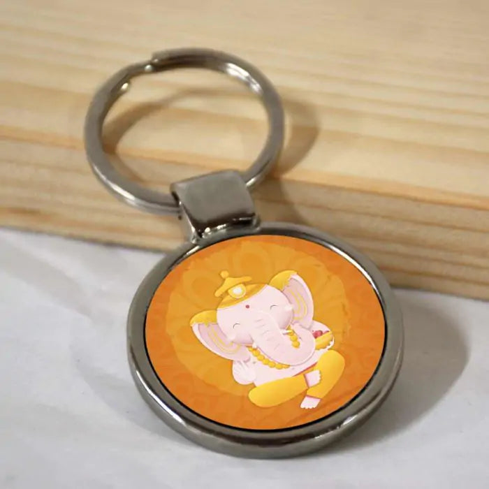 Sitting Bala Ganesha Round Metal Keychain