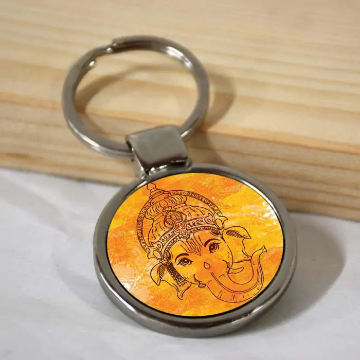 Ganesha Purple Round Metal Keychain