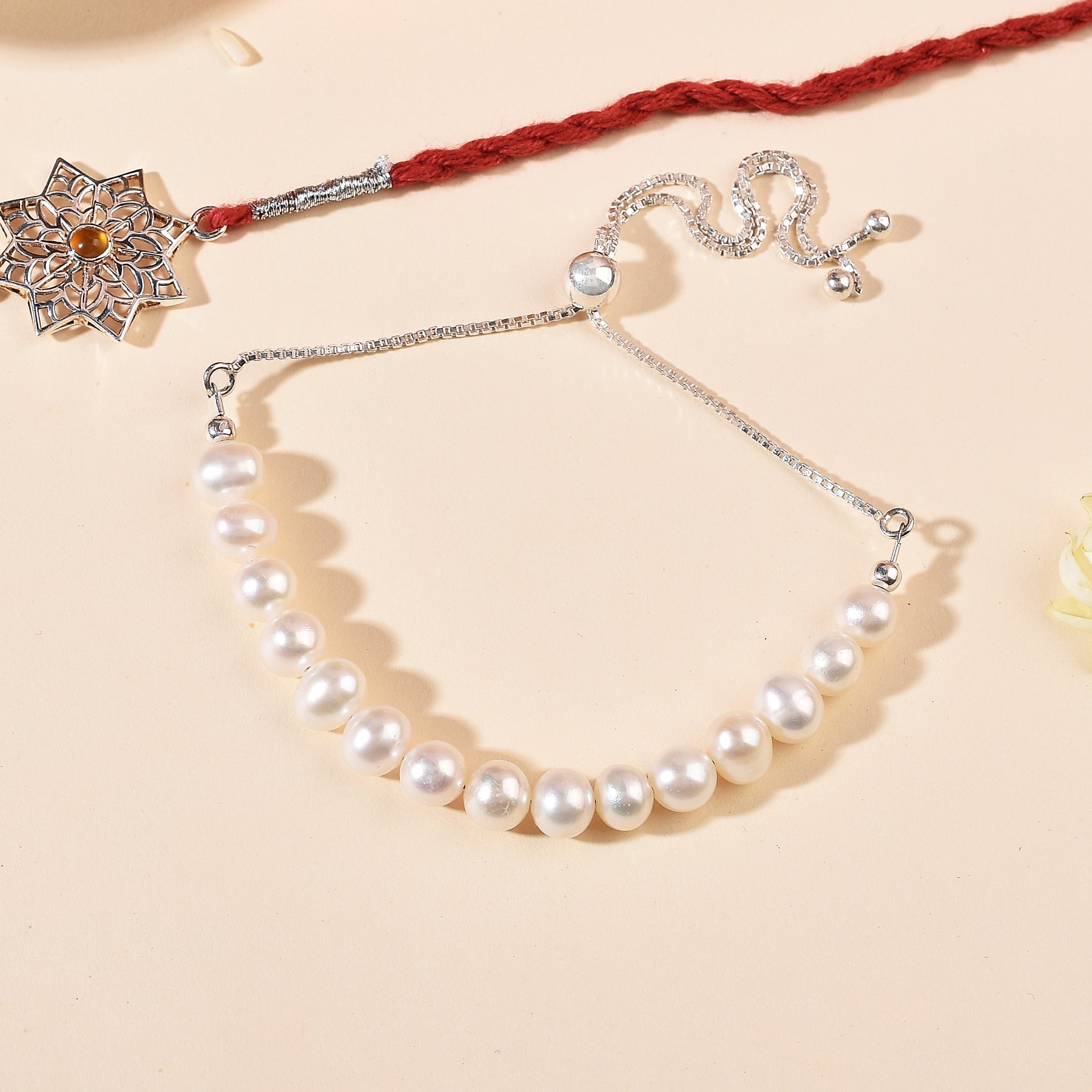 Ethereal Rakhi & Pearl Bracelet Bhaiya Bhabhi Combo Pack