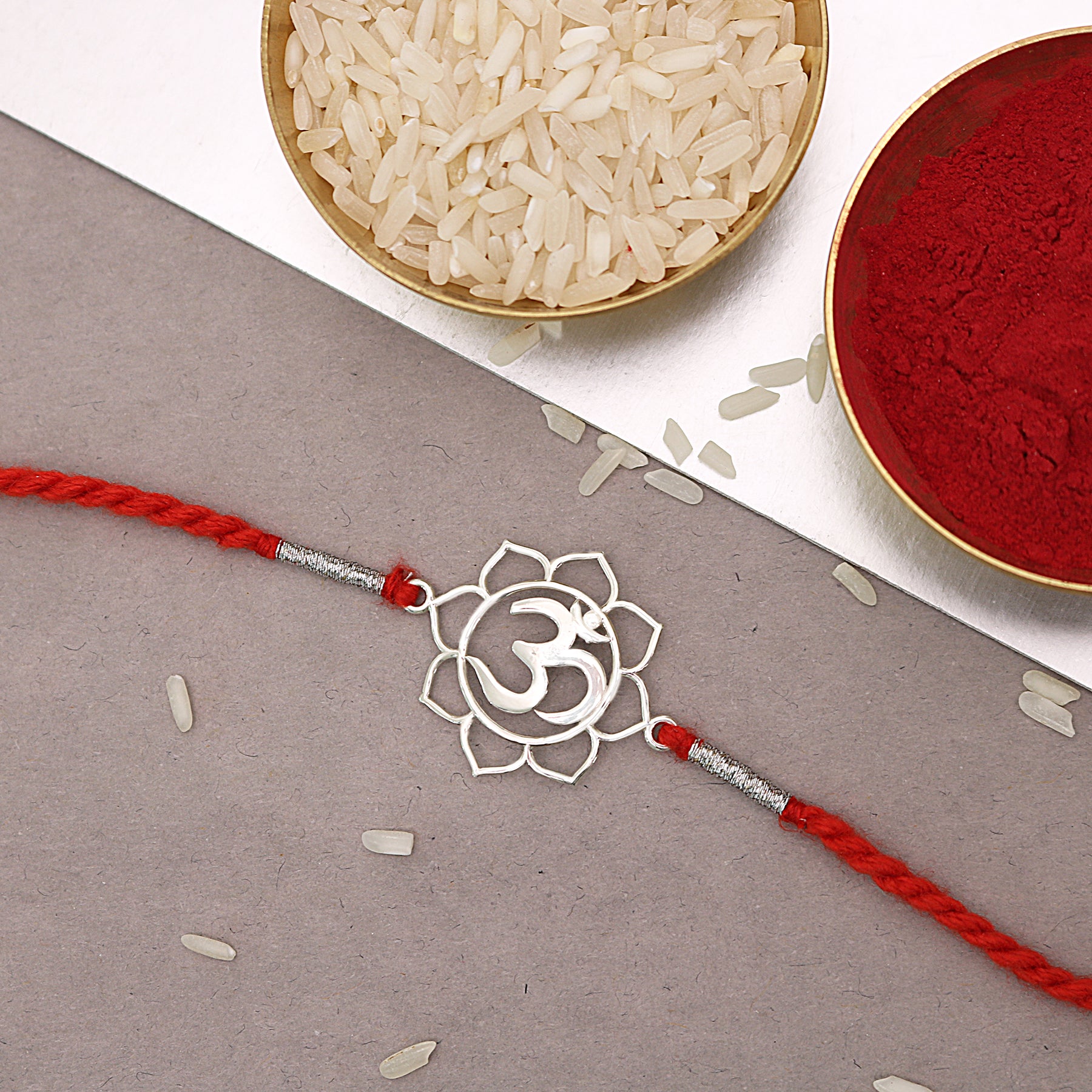 Flower OM Silver Rakhi