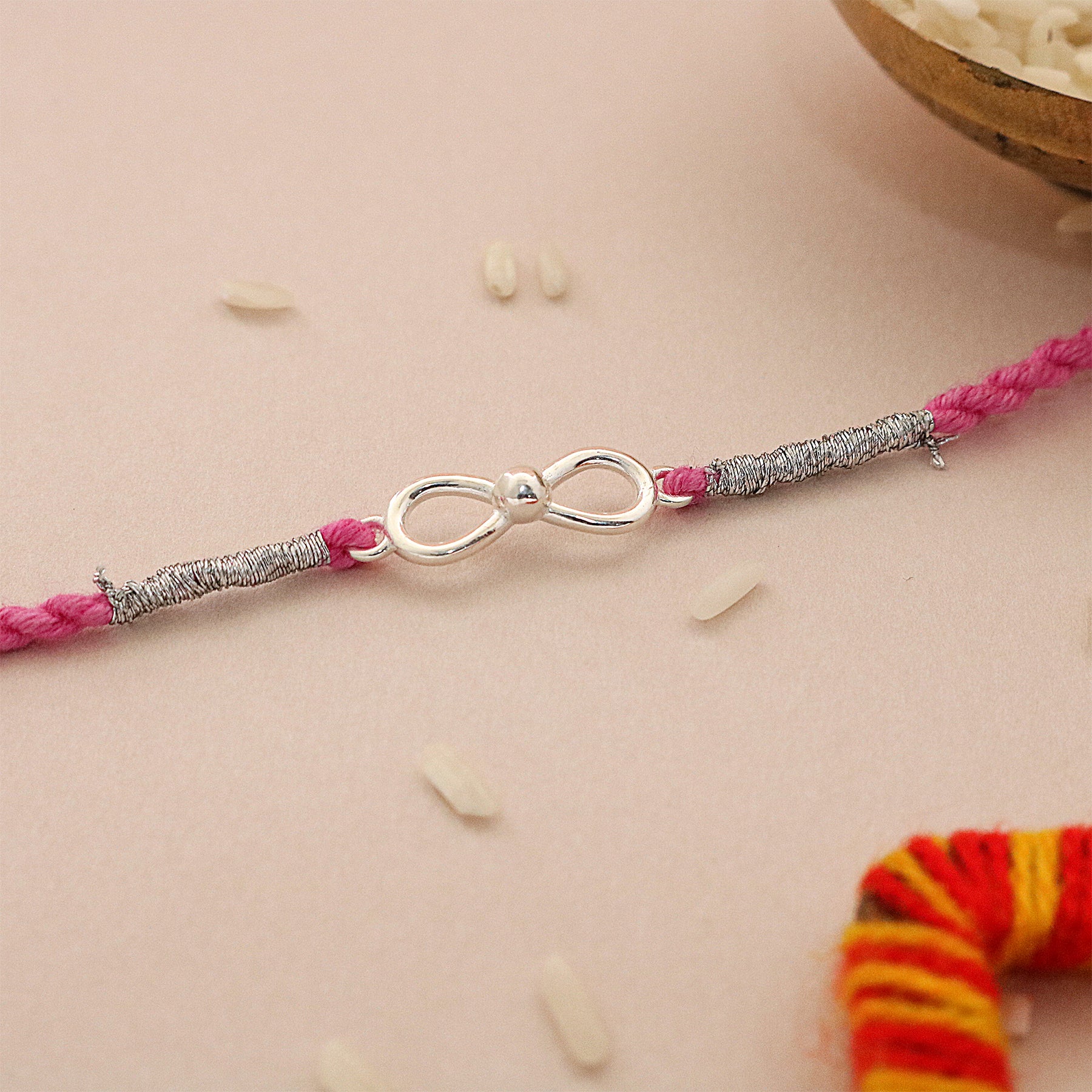 Bow Infinite Silver Rakhi