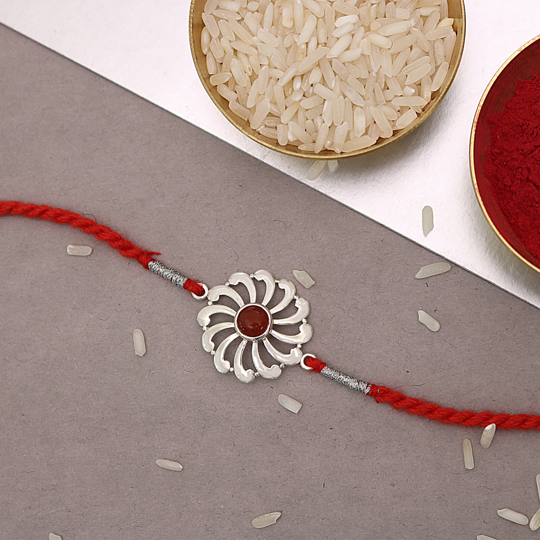 Orange Onyx Flower Wheel Silver Rakhi