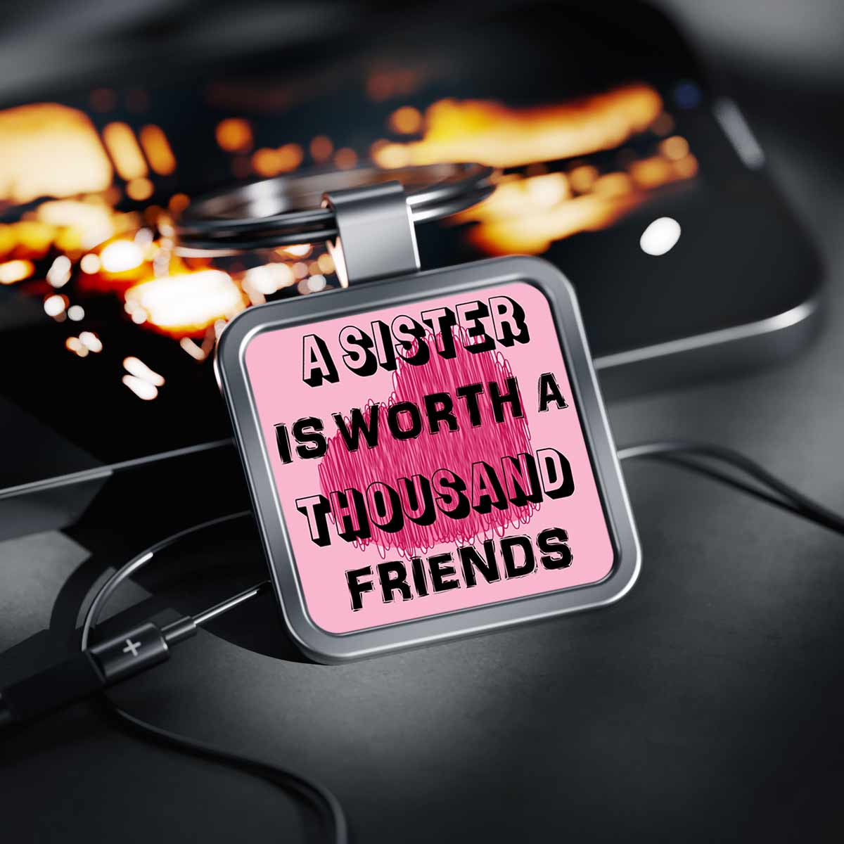 A Sister is worth Thousand Friends Metal Keychain