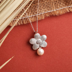 Silver Periwinkle Pendant With Stud Earrings