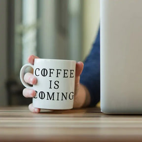 Coffee Is Coming Ceramic Mug